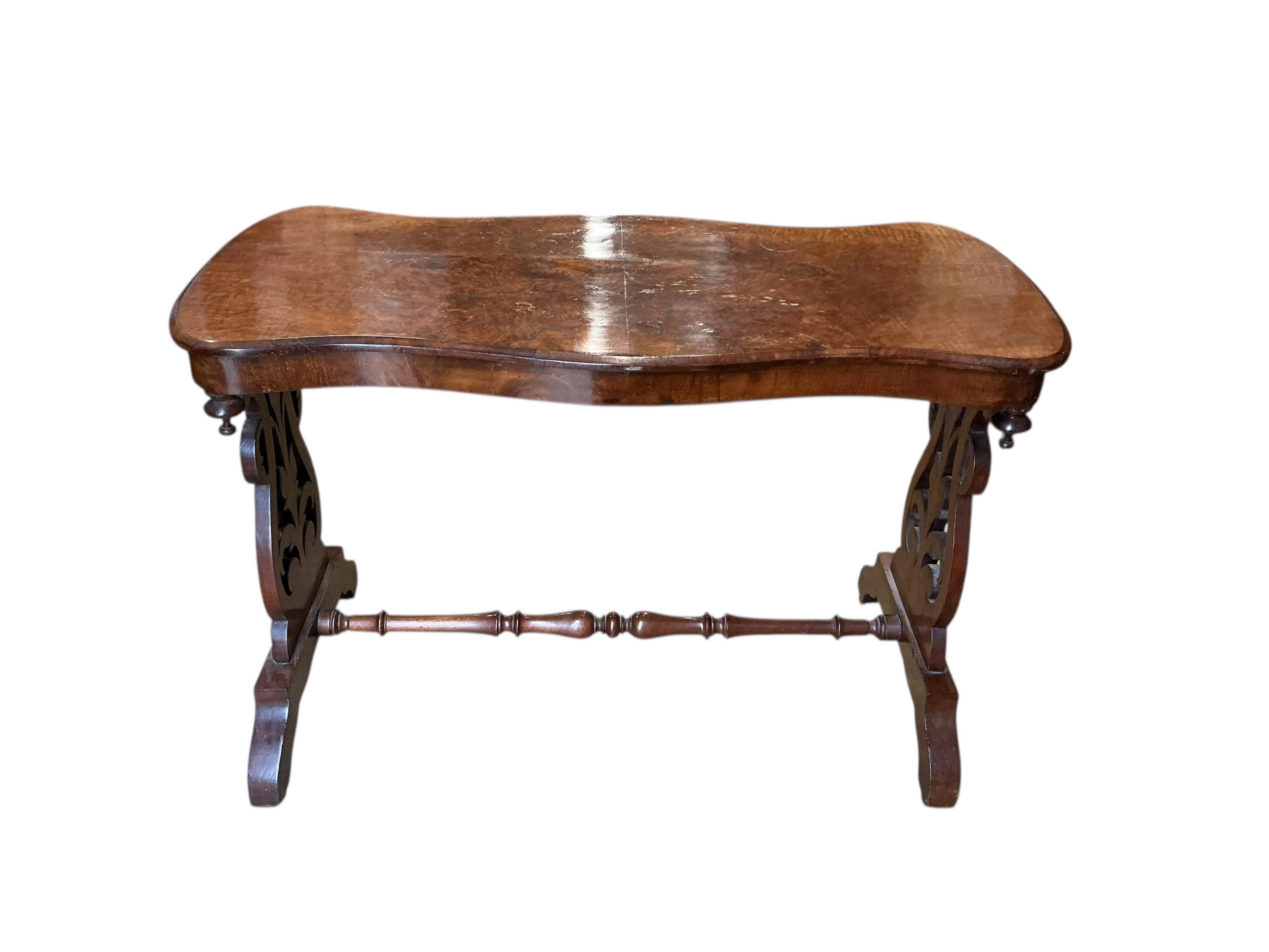A Victorian walnut serpentine centre table, width 104cm, depth 51cm, height 73cm